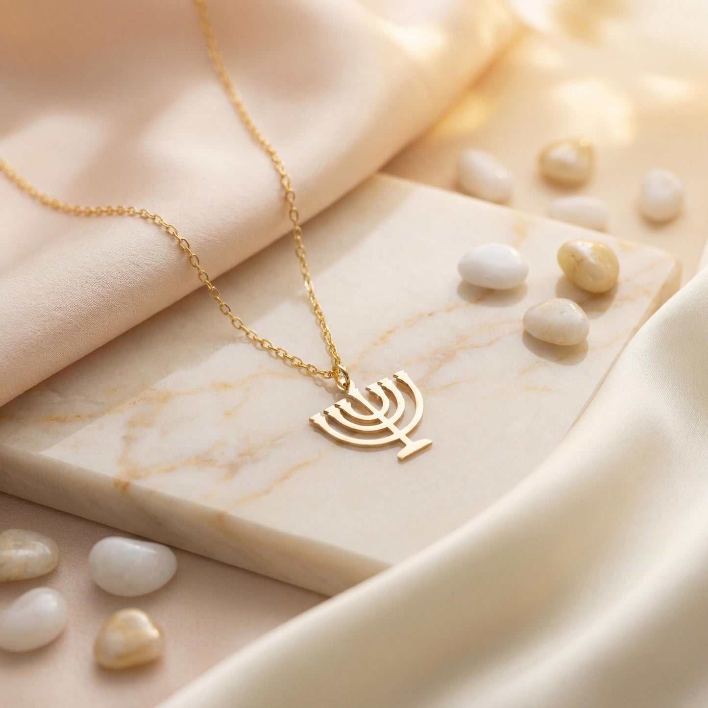 Dainty 14K gold plated minimalist Menorah necklace worn by a woman, elegant Jewish Judaica pendant jewelry ideal for Mother's Day or Bat Mitzvah gift.