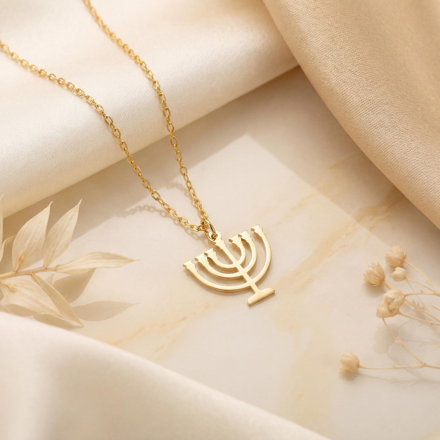 Dainty 14K gold plated minimalist Menorah necklace worn by a woman, elegant Jewish Judaica pendant jewelry ideal for Mother's Day or Bat Mitzvah gift.